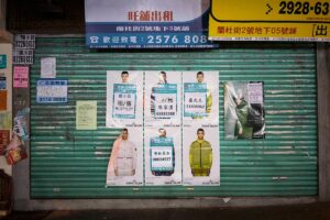Flyposters, 2019 - This subdued green shutter was covered with layers of posters across its metal surface. It caught the light as faces and notices overlapped, some peeling at the edges, others newly pasted in place. The surface held a quiet accumulation of intentions. Fashion images, phone numbers, and rental listings pressed into the same space. I read it as a single field, where identities blurred and messages lost their urgency, settling into a shared rhythm of repetition and decay.